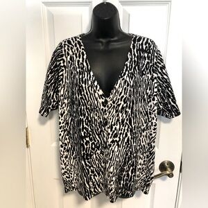 Talbots 1X short sleeve v-neck cardigan. Black/cream animal print.